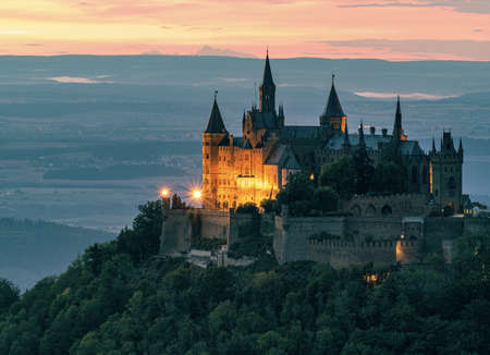 An aerial shot of the beautiful Hohenzollern Castle gleaming under the sunset in  Bisingen, Germanyのeditorial素材