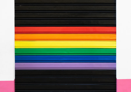 Metallic rolling shutter with rainbow colors, concept for gay pride, LGBT rights, contest, activism.の写真素材