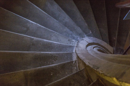 close-up of the wooden steps of a spiral staircase