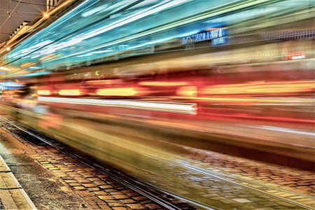 A timelapse shot of a train at night time