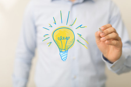 idea lamp concept in handの写真素材