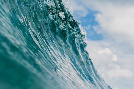 The inside view of the huge breaking wave of the sea in Mentawai islands, Indonesiaの写真素材