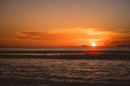 The mesmerizing view of the calm ocean during sunset in the Mentawai islands, Indonesia