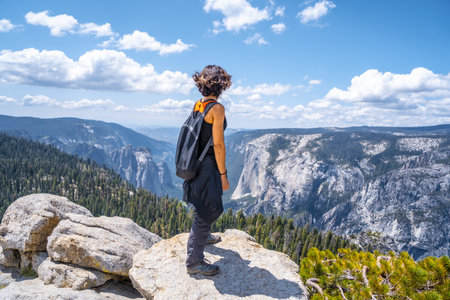 A man standing on a rock in Yosemite National Park, Sentinel Dome Yosemite the USAの写真素材