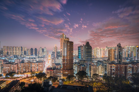 A beautiful modern city with skyscrapers and pink clouds in the sky