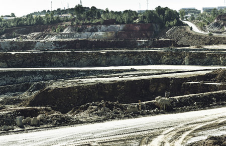 The Riotinto Mines surrounded by trees under the sunlight at daytime in Huelva in Spain