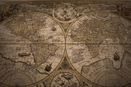 A closeup shot of a vintage world map made with puzzles
