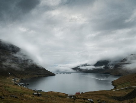 A shot of the beautiful nature such as the cliffs,  sea, mountains of the Faroe Islandsの写真素材