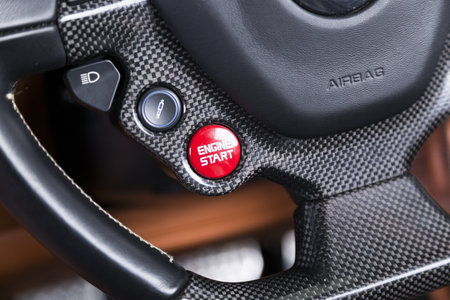 A closeup shot of the airbag mark on the steering wheel of a modern car