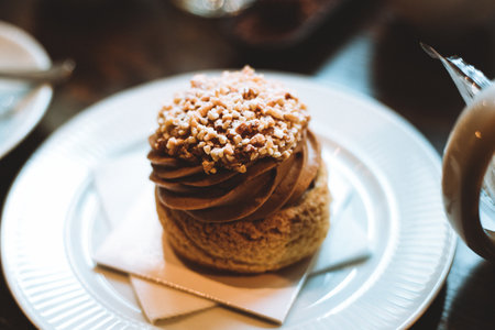 a view of a beautifully designed delicious dessert with chocolate and cinnamon with topping on it
