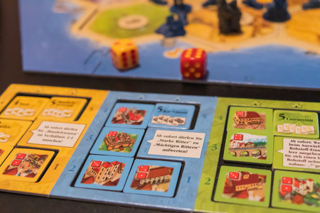 A closeup of a German board game called The Settlers of Catan