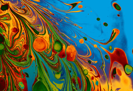 A closeup shot of an abstract background with mixed oily paints - perfect for wallpapers