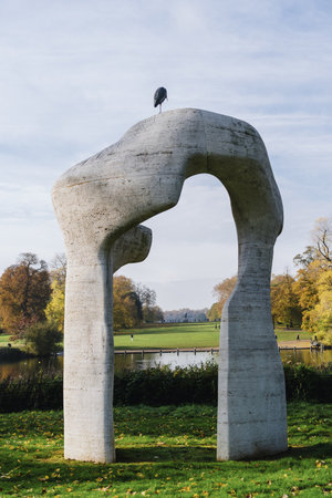 The Arch surrounded by greenery under a cloudy sky in Hyde Park, London, Englandの写真素材
