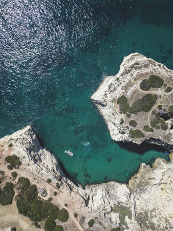 The aerial view of the sea and the cliffs