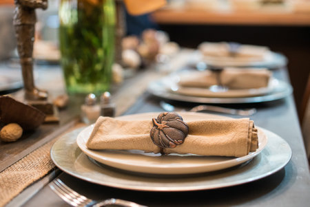 A selective focus shot of brown table napkin in a plateの写真素材