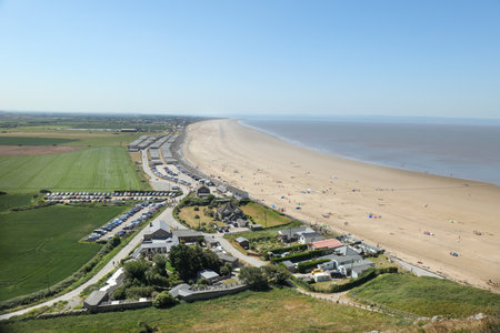 A high angel shot of Brean beach on a sunny day in Somerset, UKの写真素材