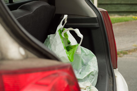 A closeup of a bag at the  in an open car trunk