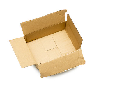 A high angle closeup shot of an empty cardboard box on a white surfaceの写真素材