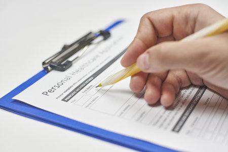 A person filling the insurance application