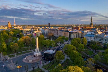 An aerial shot of the cityscape of Riga during a beautiful sunset in Latviaの写真素材