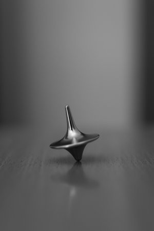 A vertical greyscale closeup shot of a whirligig - concept of reality and dreamの写真素材