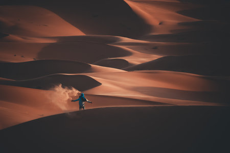An adventurous young man in a desertの写真素材