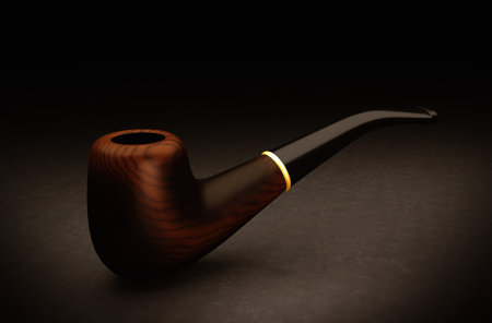 A closeup shot of wooden tobacco pipe on dark backgroundの写真素材