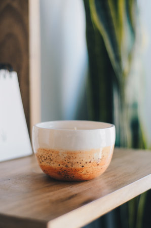 An aromatic candle on the shelfの写真素材