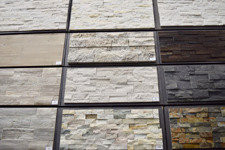 A front view of rectangle stone tile samples on display at a store for home decor