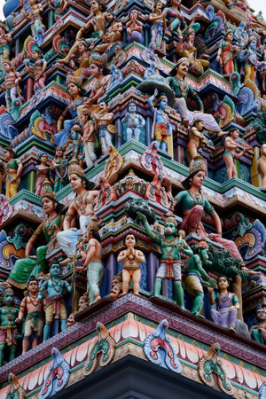 A vertical shot of the exterior facade of Sri Veeramakaliamman Hindu temple in Singaporeの写真素材