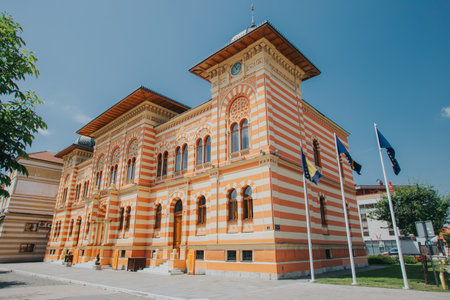 A low angle shot of City hall in Brcko district, Bosnia and Herzegovina under blue skyの写真素材