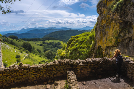 A Caucasian female tourist in Aizkorri-Aratz Natural Park in Spainの写真素材