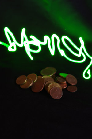 A pile of coins with light effects