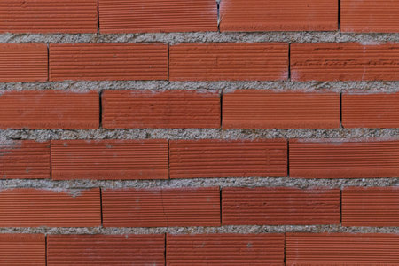 A closeup shot of a red brick wall for a background
