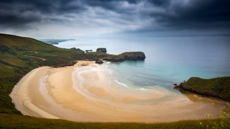 A panoramic shot of the breathtaking Playa de Torimbia beach located in Niembru, Spainの写真素材