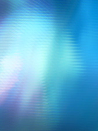 A mottled rotating abstract background with colorful light beams
