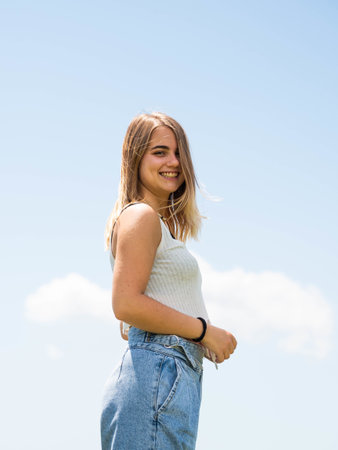 A shallow focus shot of a young attractive female posing at cameraの写真素材