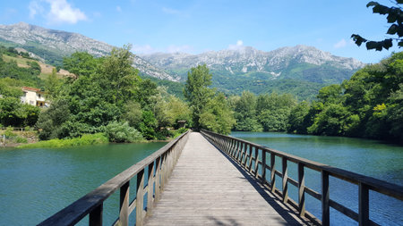 A bridge over the lake in Asturias, Spainの写真素材