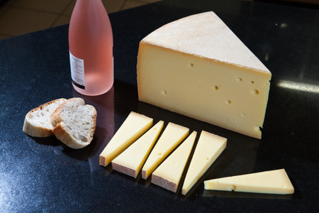 A closeup shot of French Gruyere cheese and baguette breadの写真素材