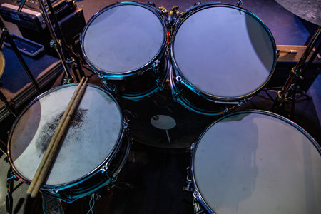 A closeup shot of drums on the stage