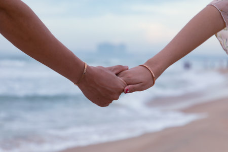 A beautiful shot of hands of a loving couple - love conceptの写真素材