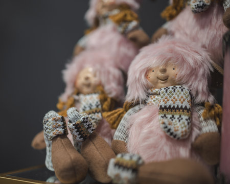 A selective focus shot of cute dolls with pink hairの写真素材