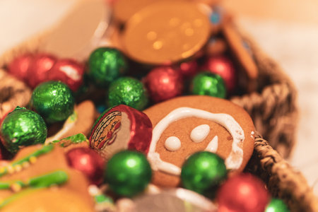 A selective focus shot of gingerbread Christmas cookies and candies