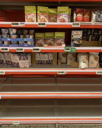 PARTILLE, SWEDEN - Mar 20, 2020: Partille, Sweden, March 20, 2020. Many empty shelves in the lokal supermarket. There are hardly any flour and stuff like that because of hoarding.のeditorial素材