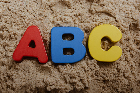 A top view of ABC wooden letters - early education concept