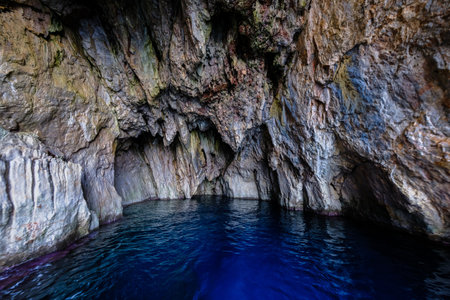 The ocean water in the rocky cave - great for wallpapersの写真素材