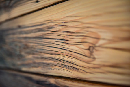 A weathered wooden texture background with natural patternsの写真素材