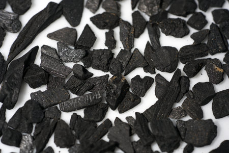 A closeup shot of black coke piecesの写真素材