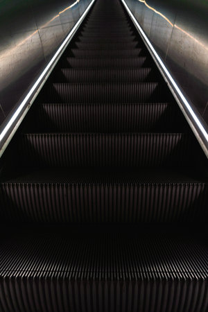 The stairs of an indoor modern escalator