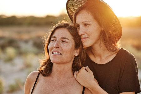 A mesmerizing shot of a lovely pregnant couple - lesbian family conceptの写真素材